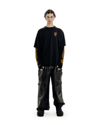 Oversized Justice Graphic Long Sleeve Top — dettaglio della stampa