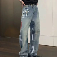 Painters Brush Distressed Baggy Jeans — dettaglio della stampa