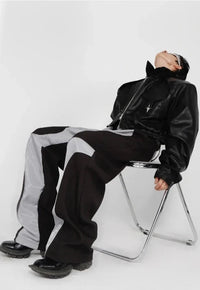 Patchwork Leather Baggy Trousers — dettaglio della stampa