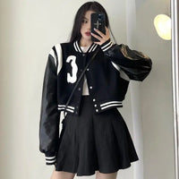 Patchwork PU Leather Black Varsity Jacket — vista frontale