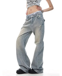 Pinstripe Micro Flared Distressed Jeans — dettaglio