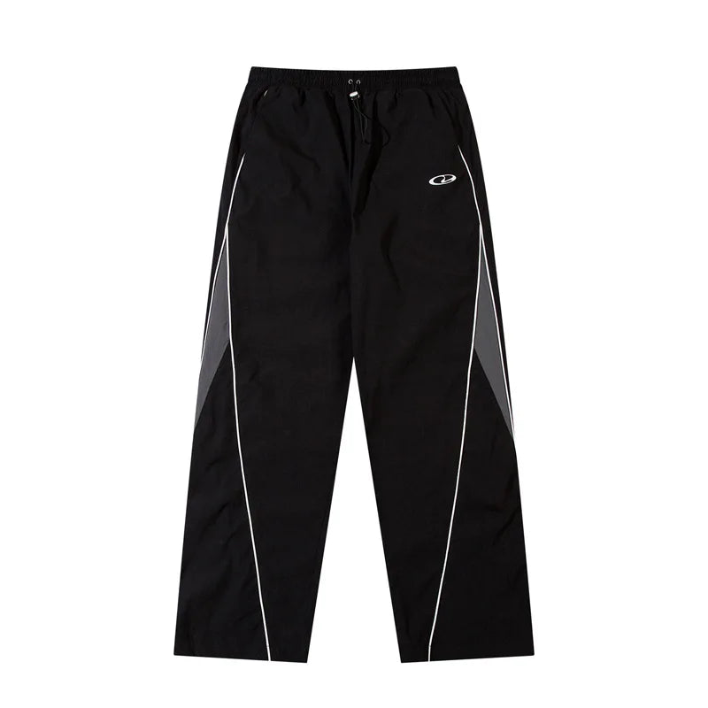 Piping Parachute Trousers — vista frontale