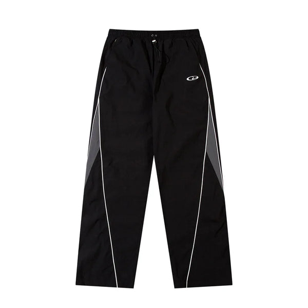 Piping Parachute Trousers — vista frontale