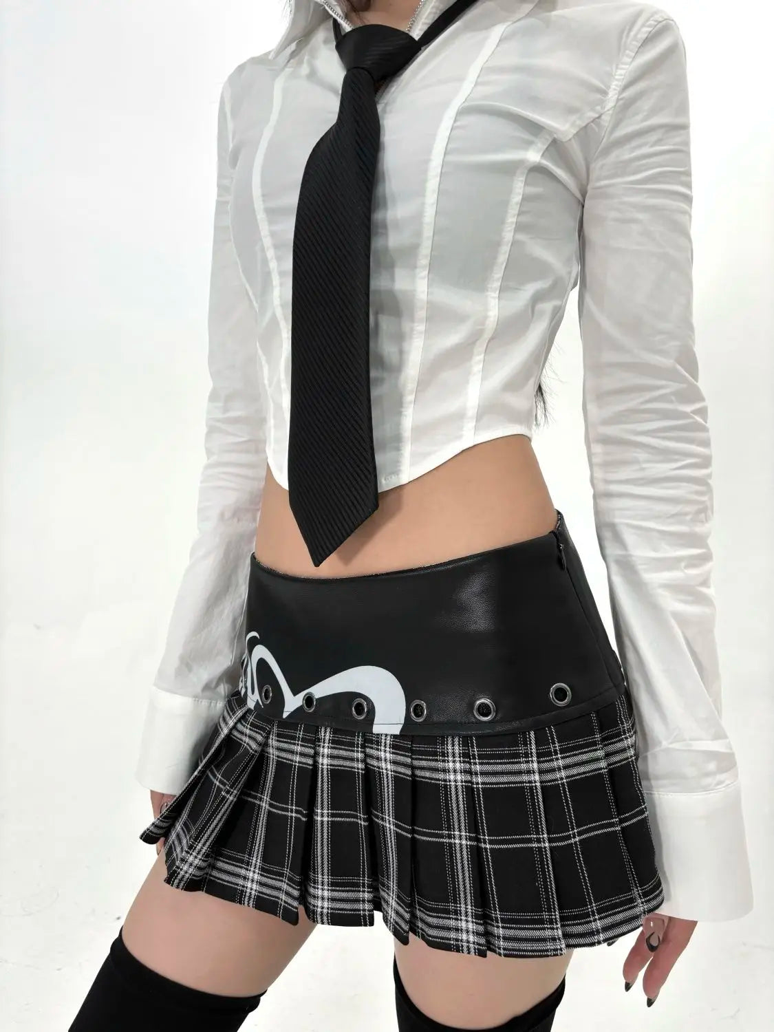 Plaid Pleated Splice Mini Skirt — dettaglio della stampa