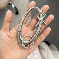 Punk Metal Star Oval Carabiner Keychain — vista frontale