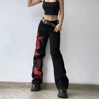 Red Snake Print Graphic Jeans — in alternativa