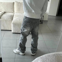 Retro Dollar Embroidered Patchwork Denim Jeans — vista posteriore