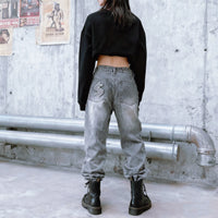 Retro Dollar Embroidered Patchwork Denim Jeans — vista frontale
