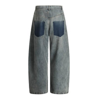 Ripped Distressed Baggy Denim Curved Barrel Jeans — dettaglio