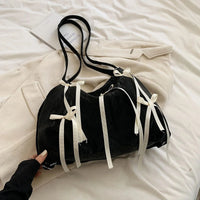 Small Ribbon Leather Shoulder Handbags — in alternativa