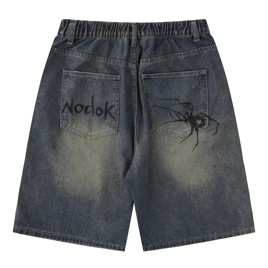 Spider Cobweb Graphic Jorts — vista laterale