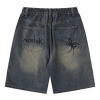 Spider Cobweb Graphic Jorts — vista laterale