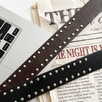 Studded Rivet Metal Circle Buckle Belt — dettaglio del tessuto