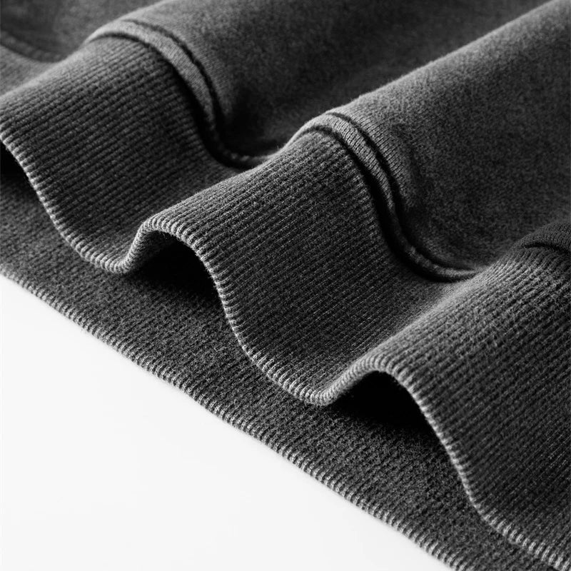 The Savoir Graphic Black Hoodie — dettaglio del tessuto