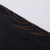 Totem Embroidered Washed Jeans — in alternativa