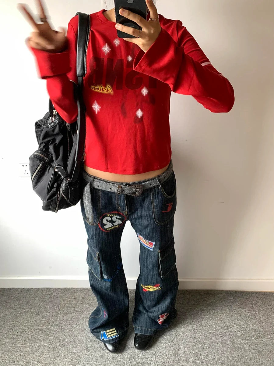 Tour Team Stamps Distressed Denim Cargo Flared Jeans — dettaglio della stampa