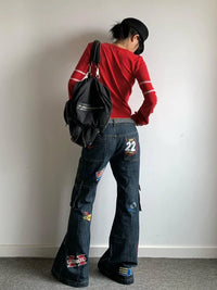Tour Team Stamps Distressed Denim Cargo Flared Jeans — vista laterale