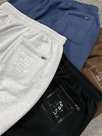 Vintage Graphic Baggy Sweatpants Jogger Trousers — vista laterale