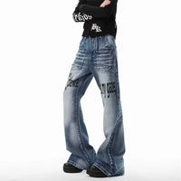 Warning Print Denim Jeans — dettaglio della stampa