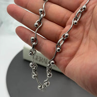 Wave Ball Chain Necklace — dettaglio della stampa