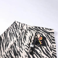 Zebra Striped Graphic Jeans — dettaglio